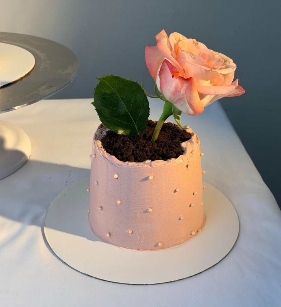Floral-inspired custom cakes with fresh flowers and soft buttercream finishes designed for elegant celebrations and intimate gatherings.