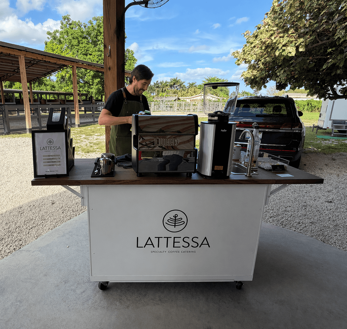 Latte Ssa Coffee cart with full espresso bar serving lattes at an elegant event in Broward, Florida