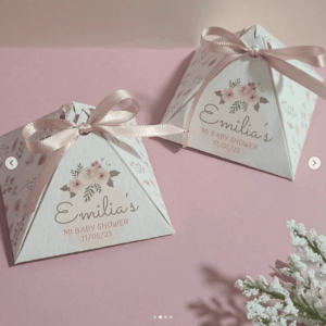 Custom baby shower favor boxes with floral designs, personalized names, event dates, and elegant ribbon details, handcrafted by FloreSer for special celebrations and memorable keepsakes